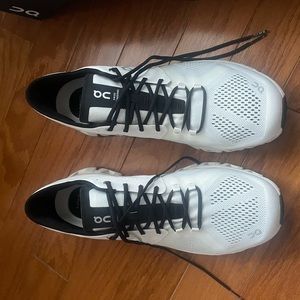 On Running Cloud X Athletic Trainers in a Size US 12.5.  White/Black color combo